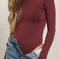 SOLID ROUND NECK LONG SLEEVE BODYSUIT